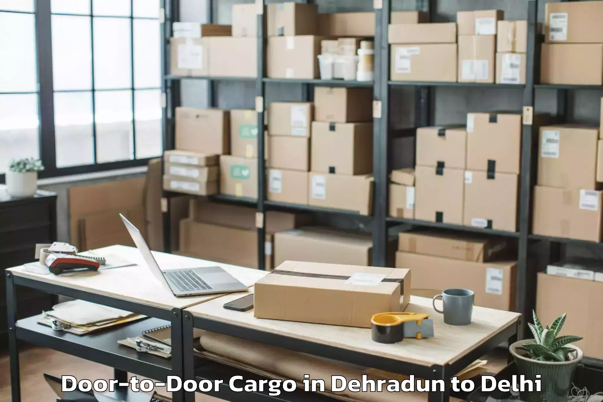 Book Dehradun to Dlf Promenade Mall Door To Door Cargo